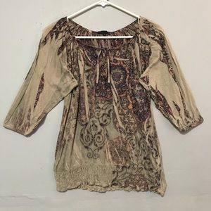 Tan cream top with colorful floral designs